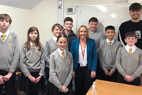 Helen with students at Sir John Talbot's school