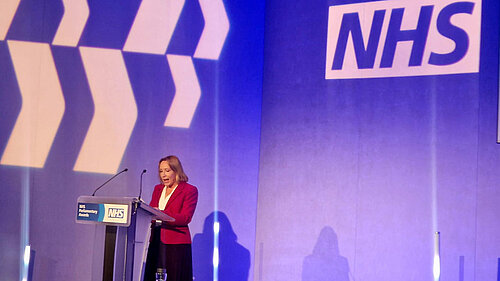 Helen Morgan talking at an NHS event