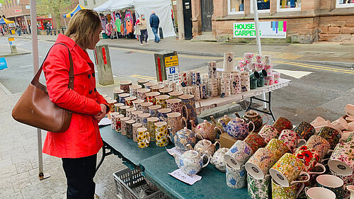 Helen browsing at a local market