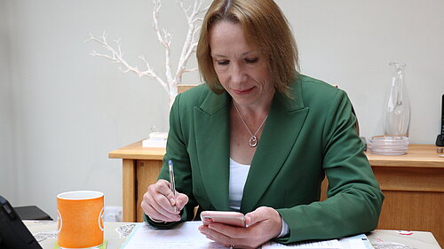 Helen at her desk