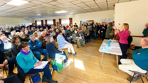 Helen addresses a public meeting regarding the proposed pylons