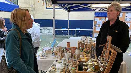 Helen with stallholder at Ellesmere Market