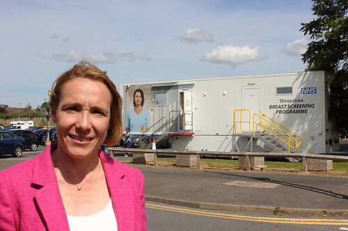 Helen Morgan with a mobile breast screening unit