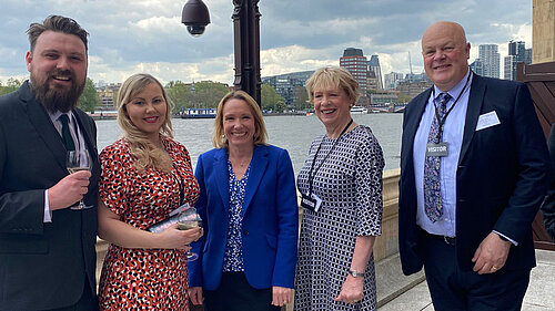 White Lion team with Helen at Parliament