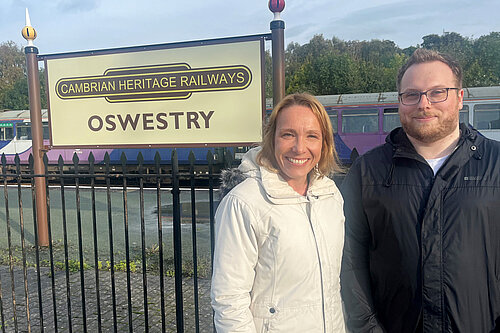 Helen Morgan with James Owen outside Oswestry Station