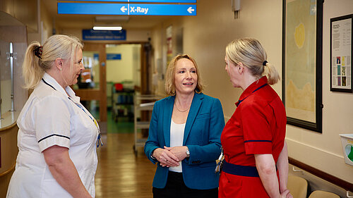 Helen listens to nurses at local hospital