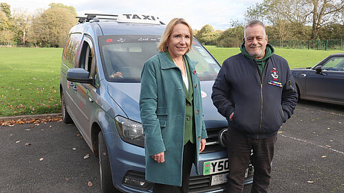 Helen Morgan with Basil and his taxi